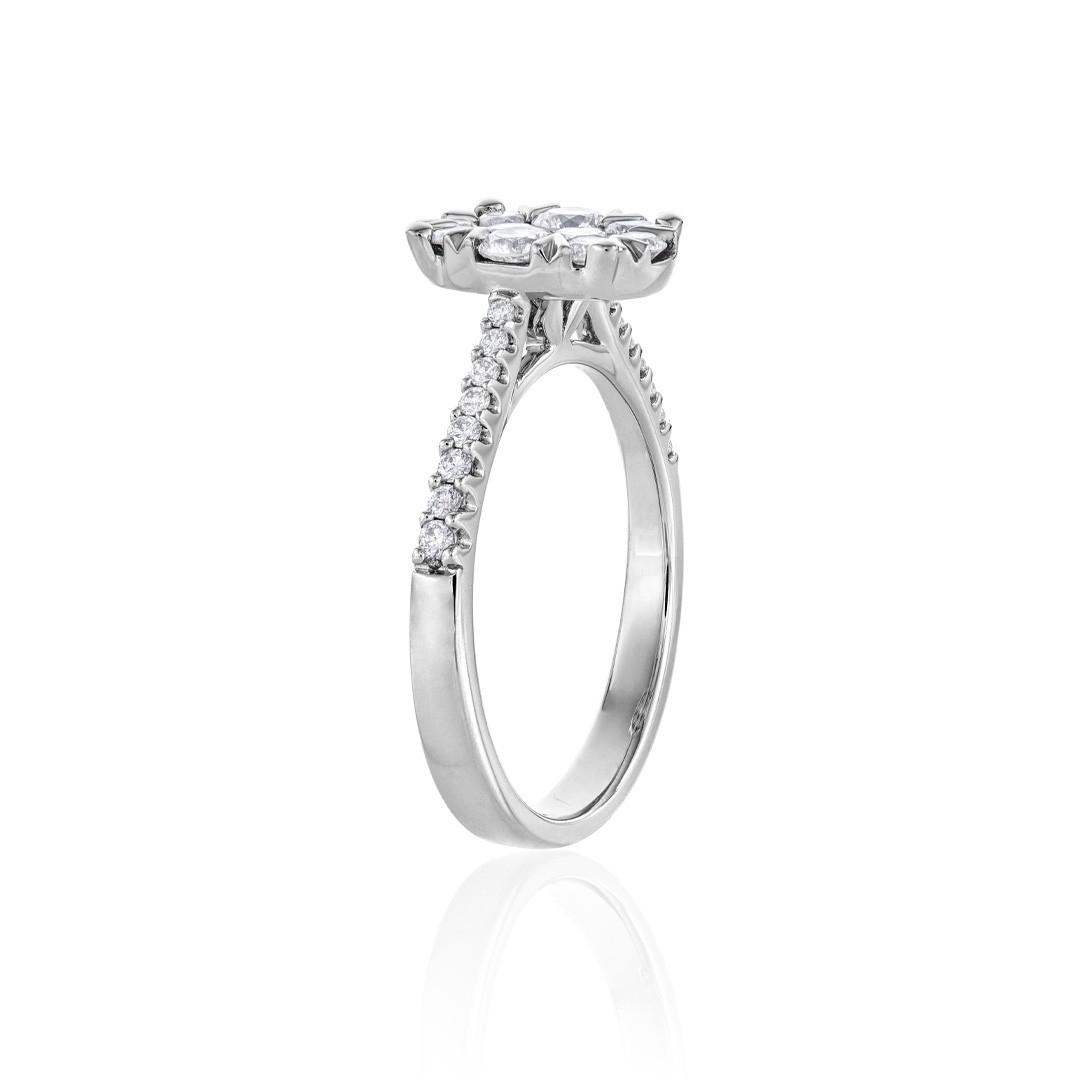 Oval-Shaped White Gold and Diamond Cluster Engagement Ring 1