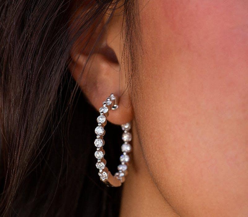 diamond hoop earrings, available at Lee Michaels Fine Jewelry stores