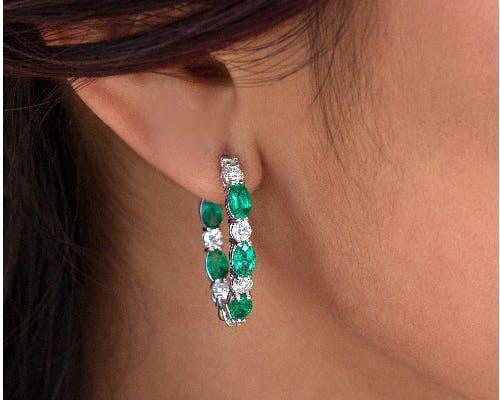 emerald and diamond hoop earrings available Lee Michaels Fine Jewelry stores