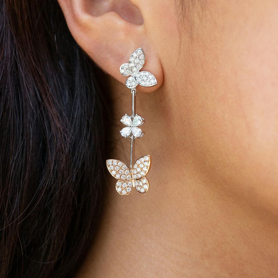 butterfly drop earrings available at Lee Michaels Fine Jewelry stores