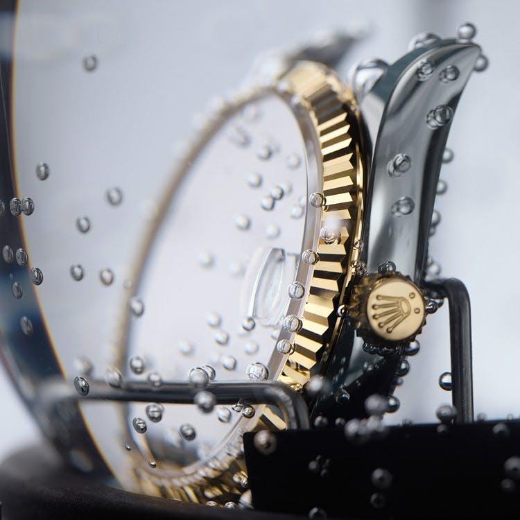 rolex watch being cleaned