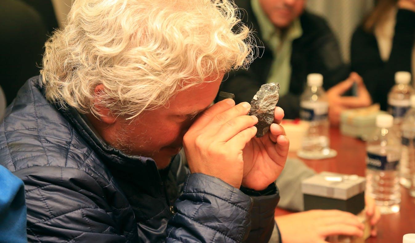 Scott Berg inspecting a natural diamond for Lee Michaels Fine Jewelry stores