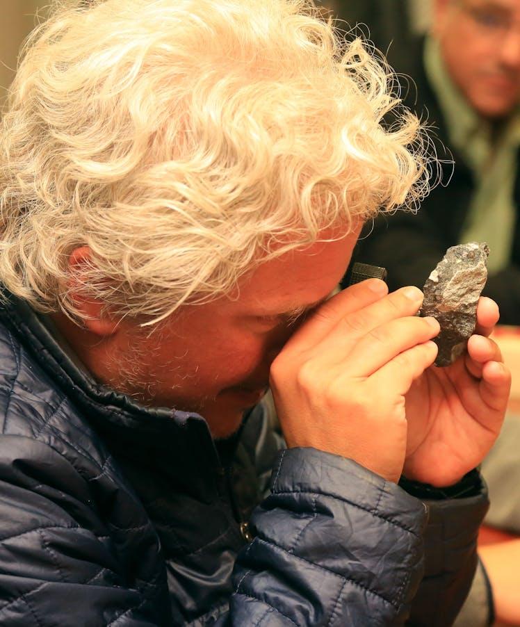 Scott Berg inspecting a natural diamond for Lee Michaels Fine Jewelry stores