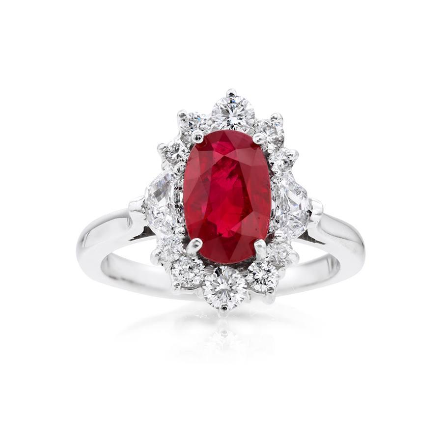 2.01 CT Oval Ruby Ring surrounded with .90 CTW Diamond Halo